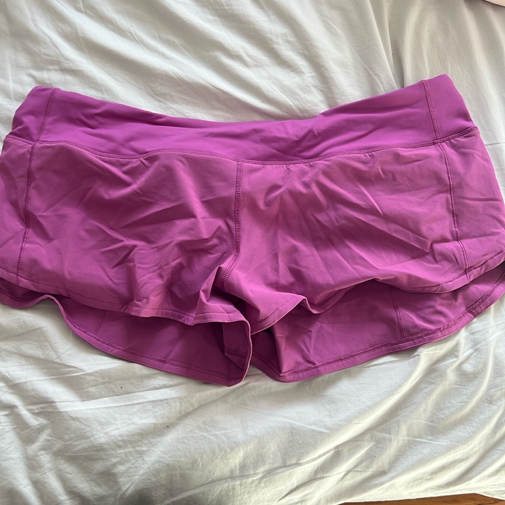 Purple lululemon shorts. Worn once or twice, in mint condition! 2.5 inseam!